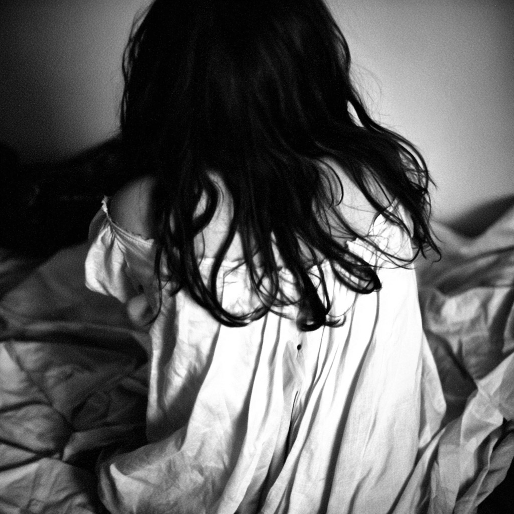 woman waking up from dreaming